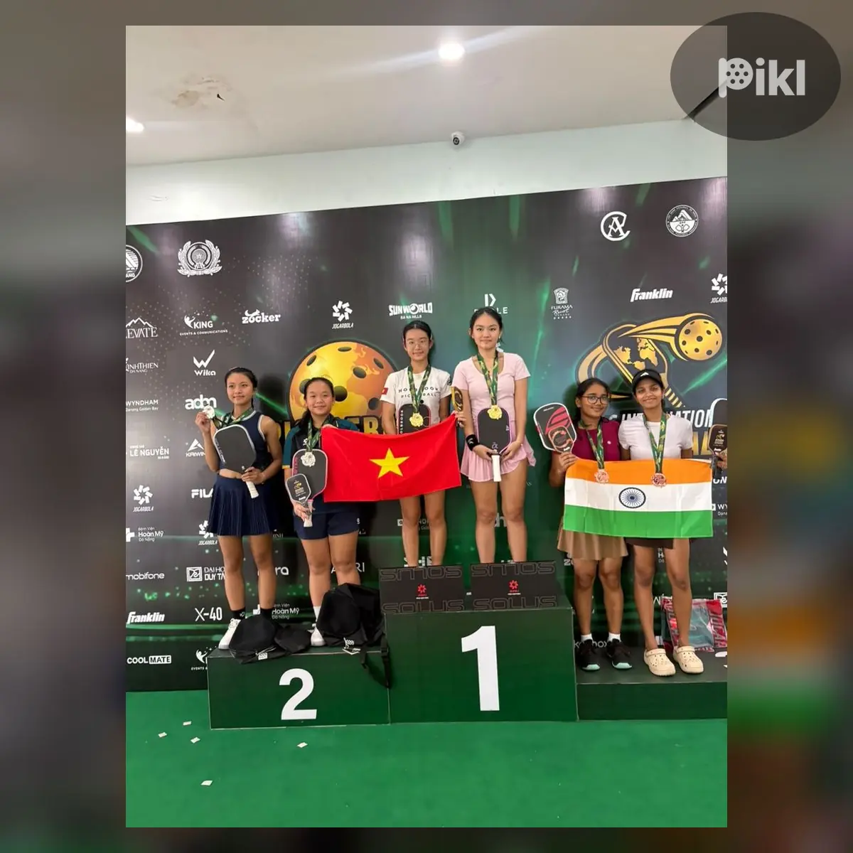 Medal ceremony — Junior · Girls' Doubles · 18 UNDER · Junior